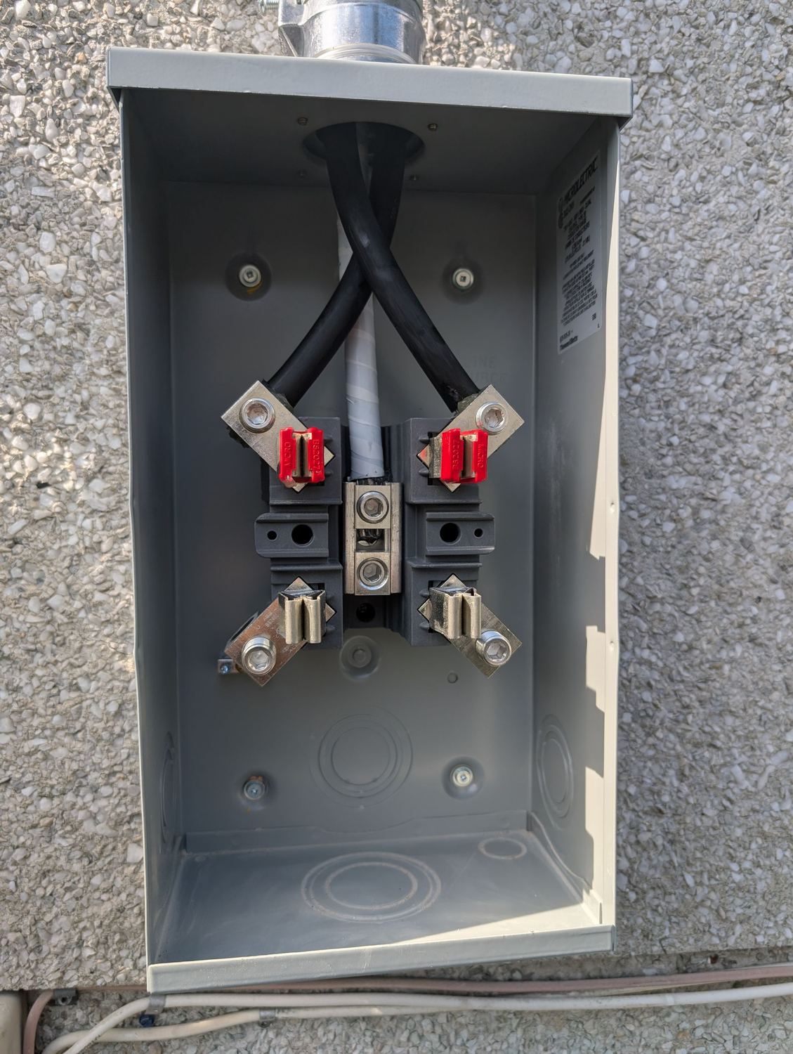 Open meter base during a service upgrade